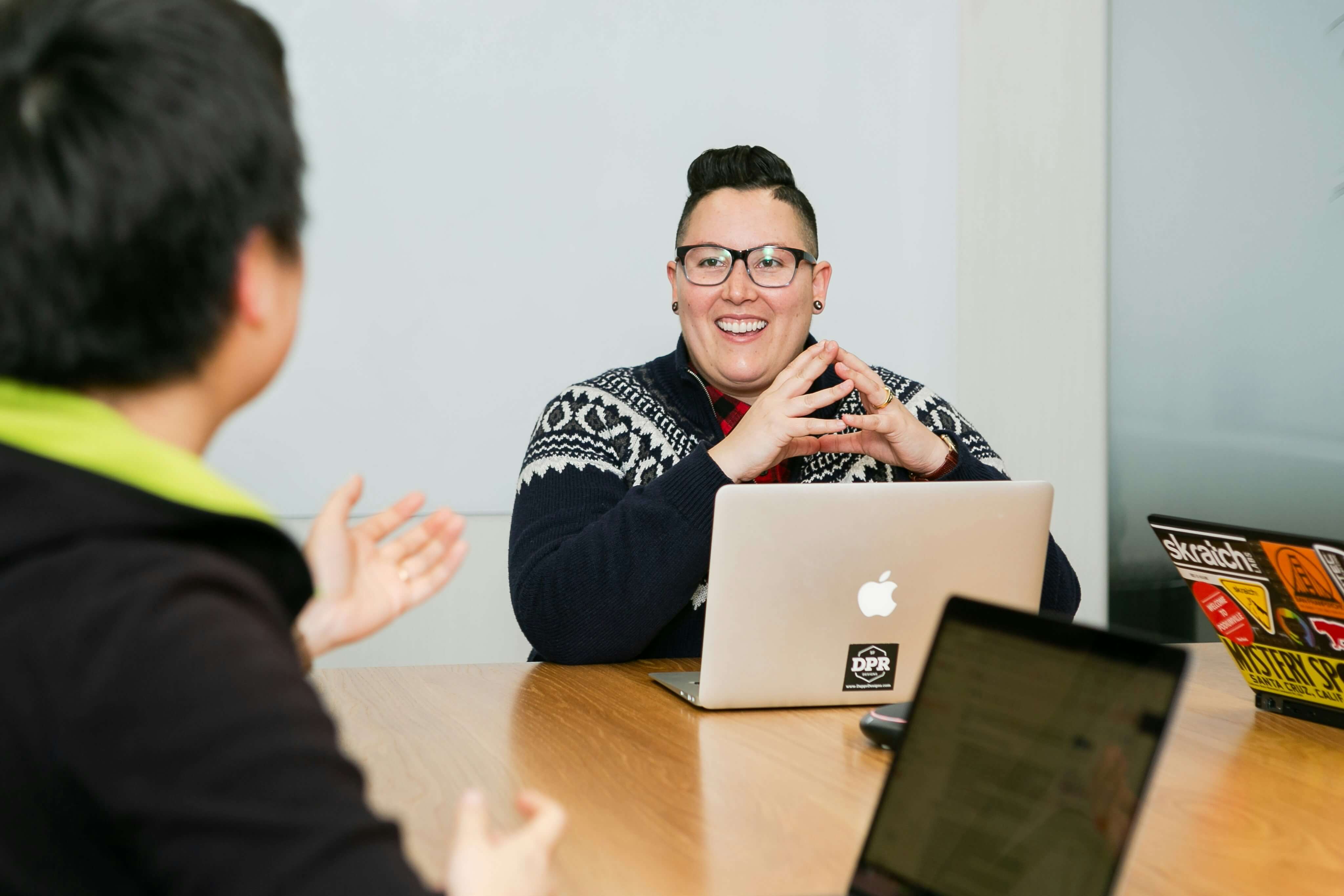 Avansi team members collaborating in a modern workplace